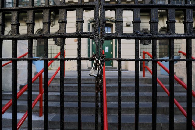 The shuttered gates at a New York City public school after officials shut down the school system to contain the spread of COVID-19.